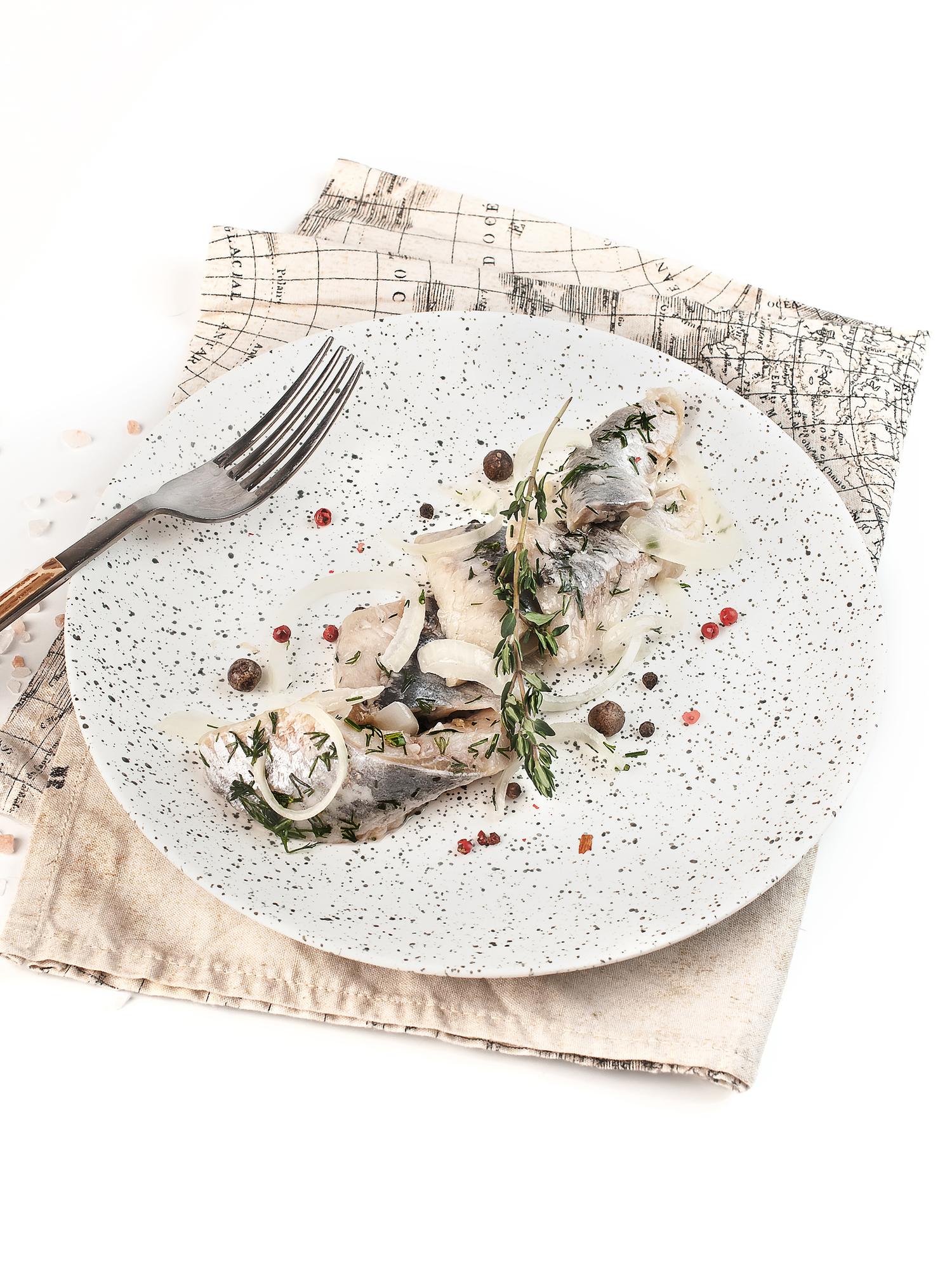 Assorted plated courses on textured linen